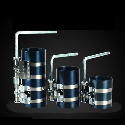Piston ring compressor tool set with adjustable clamps for secure engine piston installation.