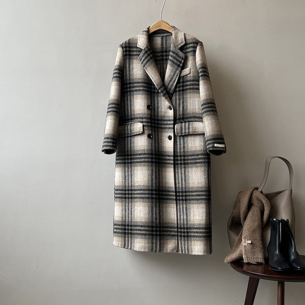 Retro double-faced woolen coat in plaid design, featuring long sleeves and pockets, displayed on a hanger.