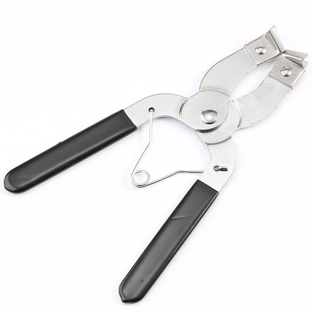 Piston ring compressor tool for engine assembly with adjustable clamp for various piston sizes.