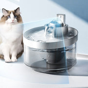 Wireless induction cat water fountain with flowing water and a cat nearby, promoting hydration for pets.